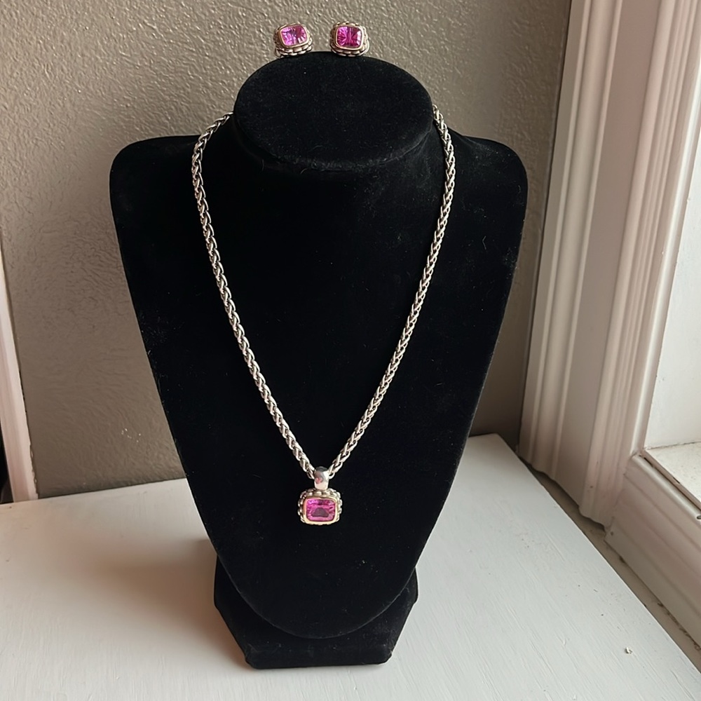 Stunning 18 kt. gold and silver pink sapphire set by Lorenzo.